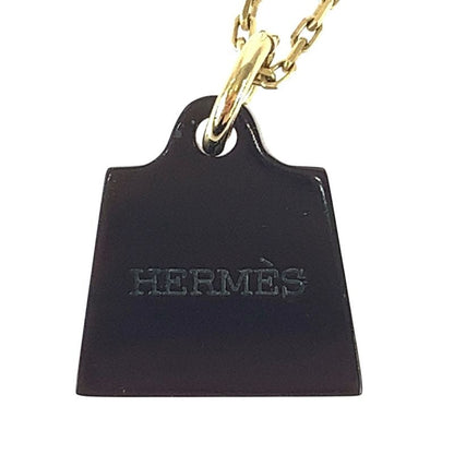 HERMES Amulet Marokinier Gold Black Metal Buffalo Horn Necklace Pendant Women's