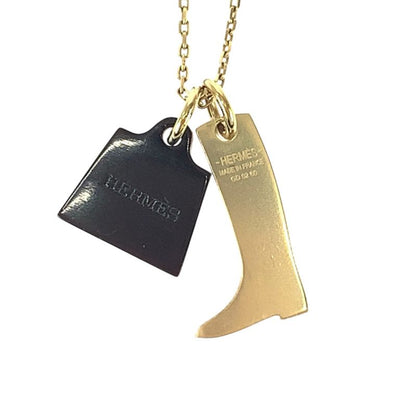 HERMES Amulet Marokinier Gold Black Metal Buffalo Horn Necklace Pendant Women's