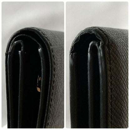 Louis Vuitton Taiga Portefeuille Amerigo NM Bifold Wallet