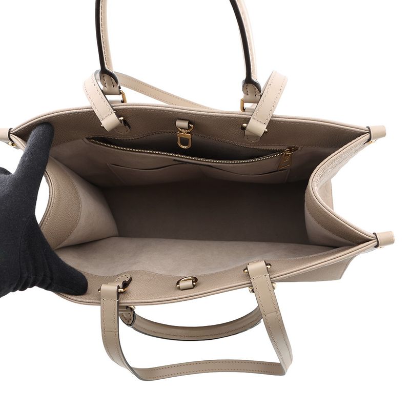 Louis Vuitton Tote Monogram Empreinte on the Go MM Tourtrail
