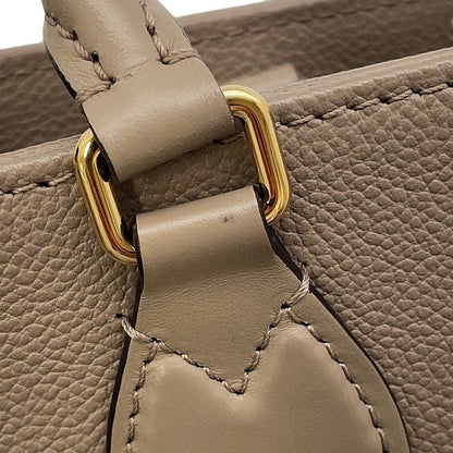 Louis Vuitton Tote Monogram Empreinte on the Go MM Tourtrail