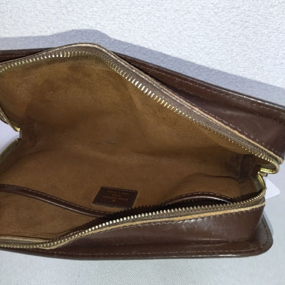 Louis Vuitton Saint Damier Clutch Brown