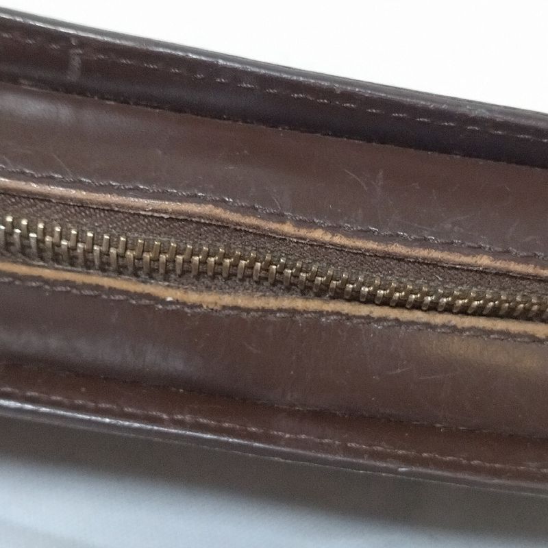 Louis Vuitton Saint Damier Clutch Brown