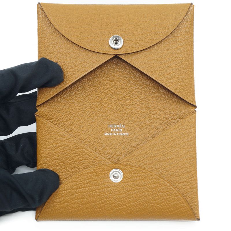 Hermes Calvi Duo Coin Case Manufactured in Leather Beige