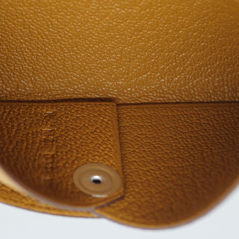 Hermes Calvi Duo Coin Case Manufactured in Leather Beige