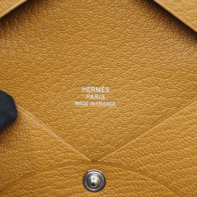 Hermes Calvi Duo Coin Case Manufactured in Leather Beige
