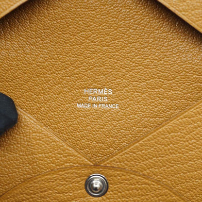 Hermes Calvi Duo Coin Case Manufactured in Leather Beige