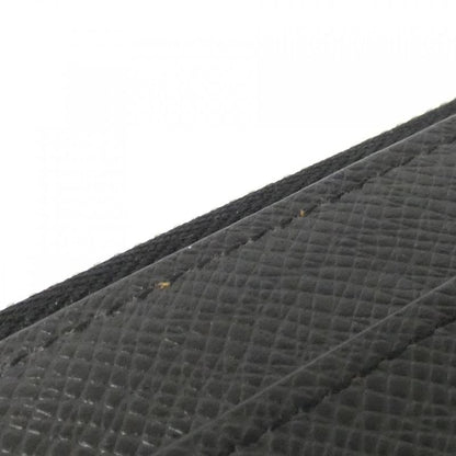 Louis Vuitton Taiga Zippy Dragonne Wallet