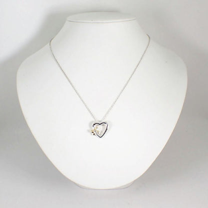 Tiffany & Co. 925 750 Ribbon Pendant