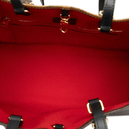 Louis Vuitton Monogram Giant Reverse on the Go MM Shoulder Bag