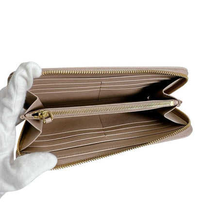 Prada Zip Around Long Wallet Saffiano Cipria
