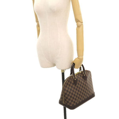 Louis Vuitton Damier Alma Cotton Brown
