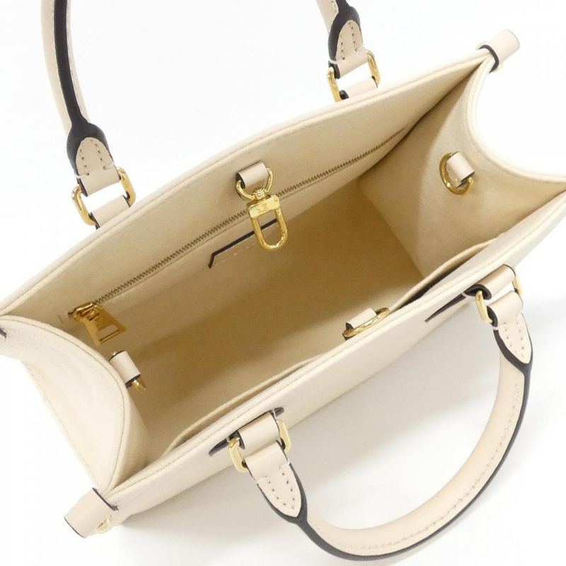 Louis Vuitton Monogram Empreinte on the Go PM Bag