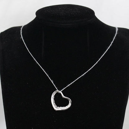 Tiffany & Co. Open Heart Pendant Top Diamond