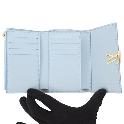 Louis Vuitton Trifold Wallet Taurillon Leather Portefeuille Capucines Compact Lilac