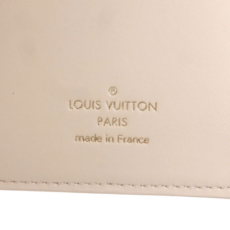 Louis Vuitton Vertical Wallet Long Taurillon
