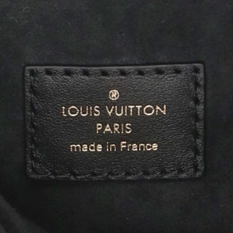 Louis Vuitton Pochette Metis Monogram Leather Backpack