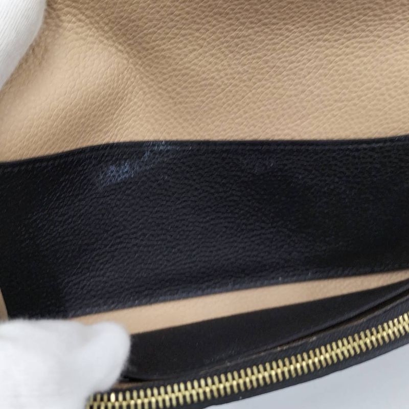 Louis Vuitton Portefeuille Emily Bifold Long Wallet Monogram Empreinte