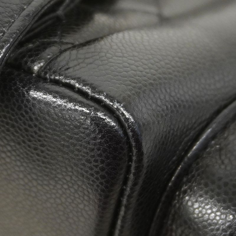 Chanel Backpack Quilted Caviar Leather Black Champagne Gold