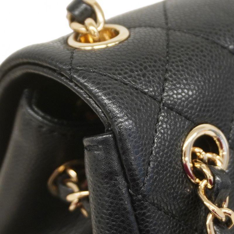 Chanel Backpack Quilted Caviar Leather Black Champagne Gold