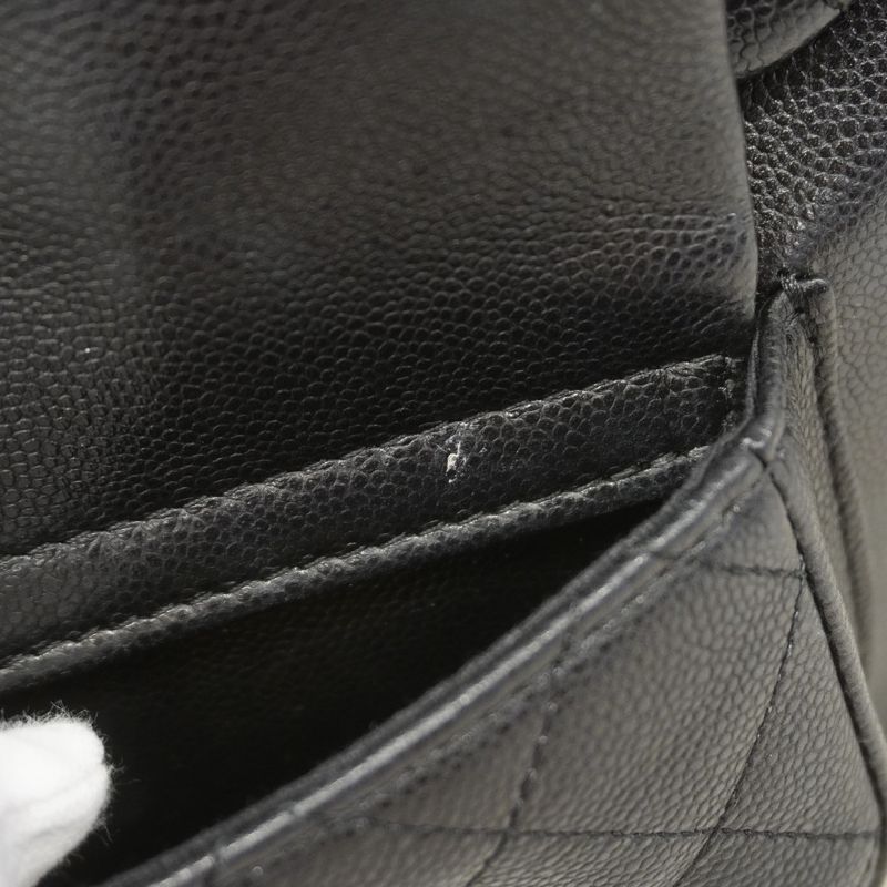 Chanel Backpack Quilted Caviar Leather Black Champagne Gold