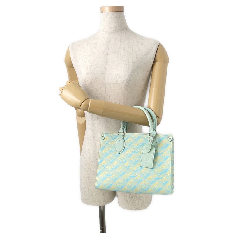 Louis Vuitton Handbag Monogram Empreinte on the Go PM Summer Star Dust Blue-yellow