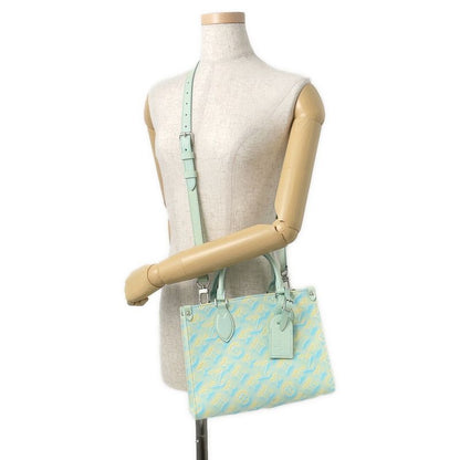 Louis Vuitton Handbag Monogram Empreinte on the Go PM Summer Star Dust Blue-yellow