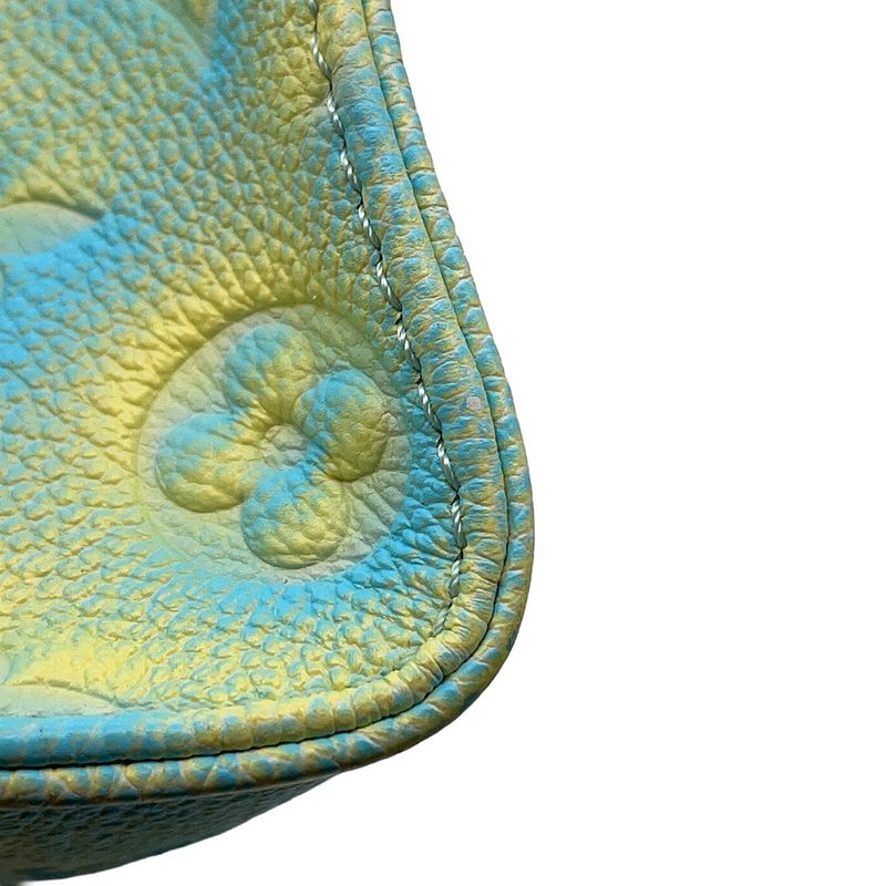 Louis Vuitton Handbag Monogram Empreinte on the Go PM Summer Star Dust Blue-yellow