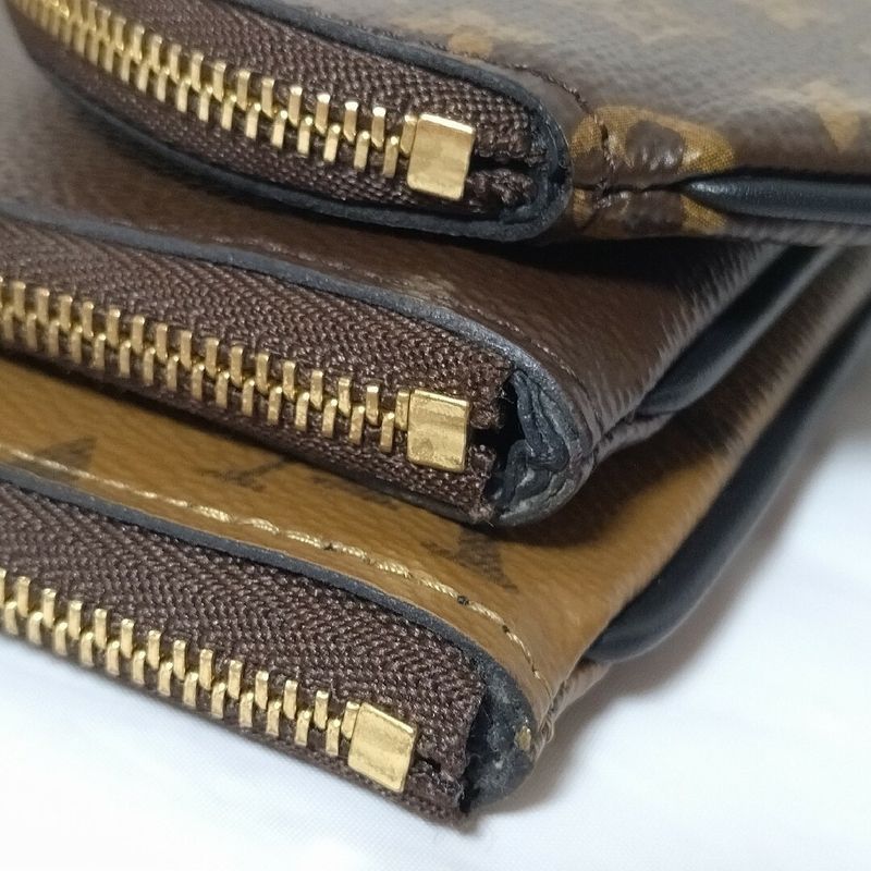 Louis Vuitton Pochette Trio Monogram Pouch