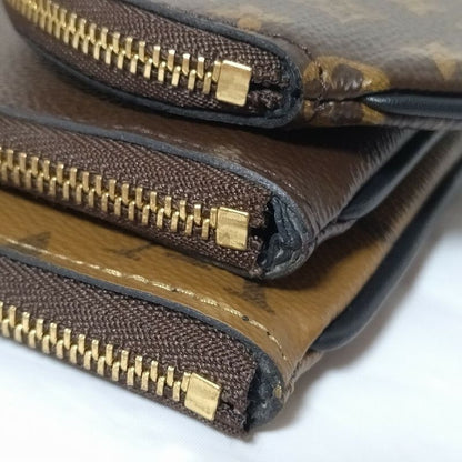Louis Vuitton Pochette Trio Monogram Pouch