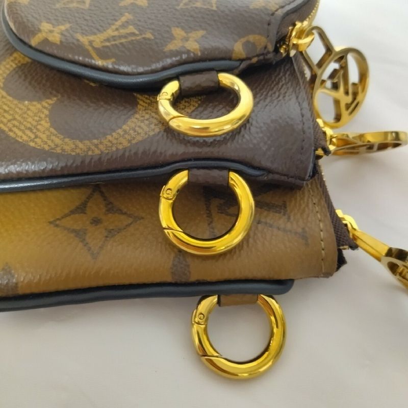 Louis Vuitton Pochette Trio Monogram Pouch