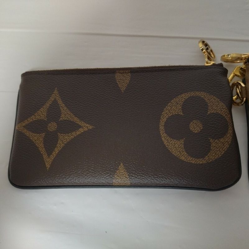 Louis Vuitton Pochette Trio Monogram Pouch