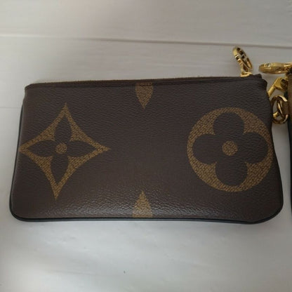 Louis Vuitton Pochette Trio Monogram Pouch