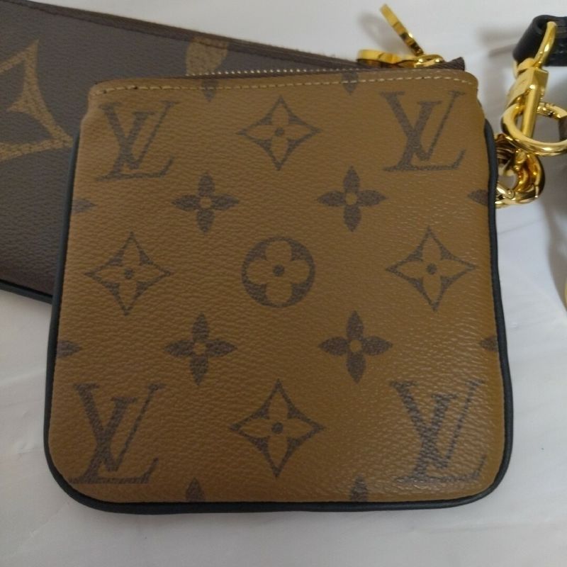 Louis Vuitton Pochette Trio Monogram Pouch