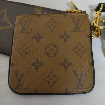 Louis Vuitton Pochette Trio Monogram Pouch