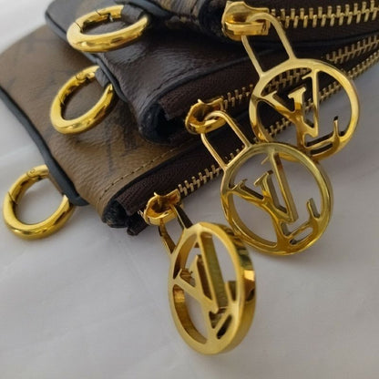 Louis Vuitton Pochette Trio Monogram Pouch