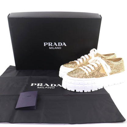 Prada Double Wheel Triangle Logo with Rhinestone Leather Low Cut Sneakers Gold