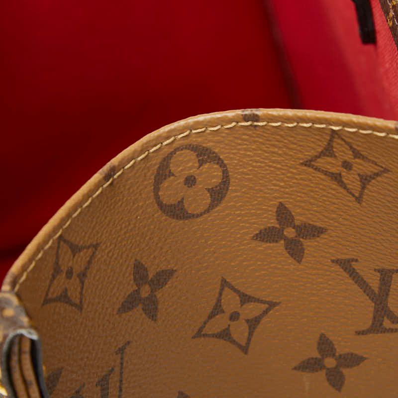 Louis Vuitton Monogram Giant Reverse on the Go MM Shoulder Bag