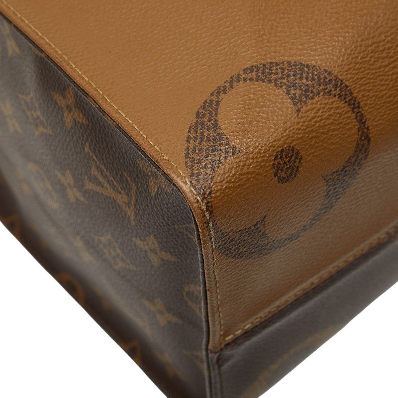 Louis Vuitton Monogram Giant Reverse on the Go MM Shoulder Bag