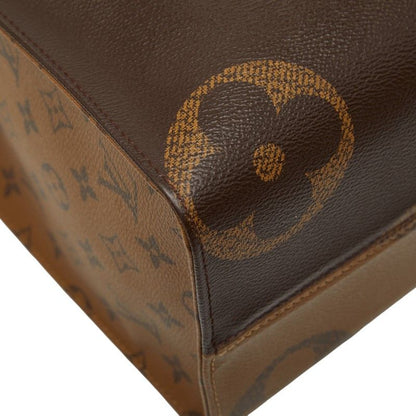 Louis Vuitton Monogram Giant Reverse on the Go MM Shoulder Bag