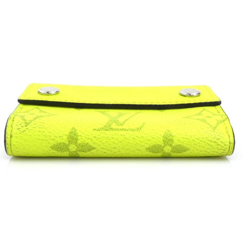 Louis Vuitton Trifold Wallet Taiga Llama Discovery Compact