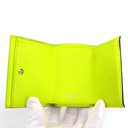 Louis Vuitton Trifold Wallet Taiga Llama Discovery Compact