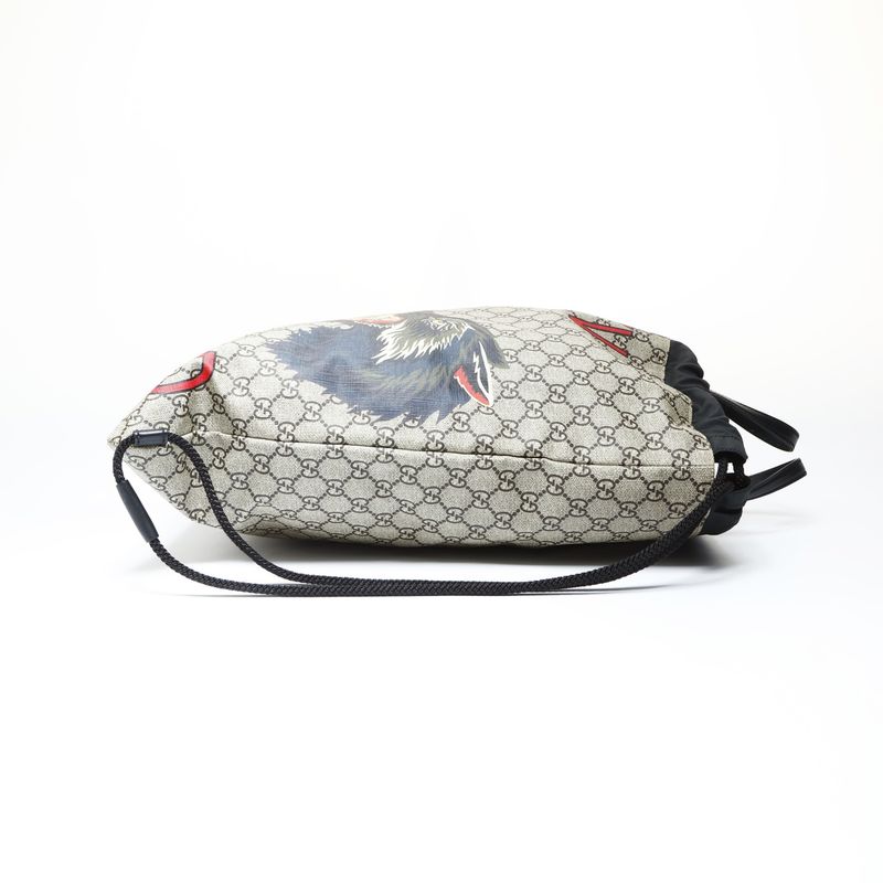 Gucci GG Supreme Drawstring Wolf Backpack