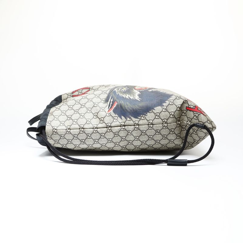 Gucci GG Supreme Drawstring Wolf Backpack