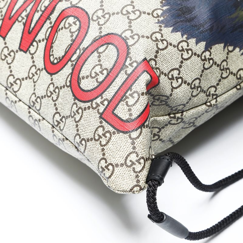 Gucci GG Supreme Drawstring Wolf Backpack