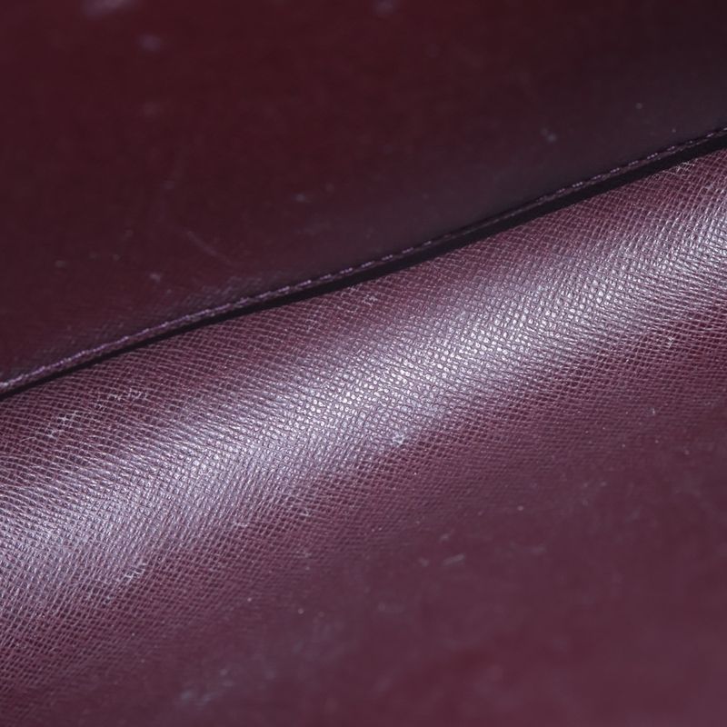 Louis Vuitton Taiga Baikal Grizzly Gold Leather Clutch Brown
