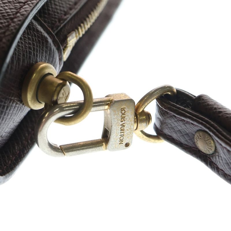 Louis Vuitton Taiga Baikal Grizzly Gold Leather Clutch Brown