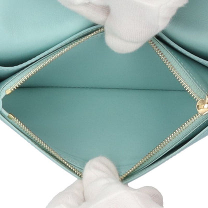 Louis Vuitton Vertical Wallet Taurillon Leather Beige Gale
