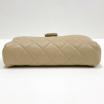 Chanel Quilted Mini Pouch Handbag Lambskin Beige Gold
