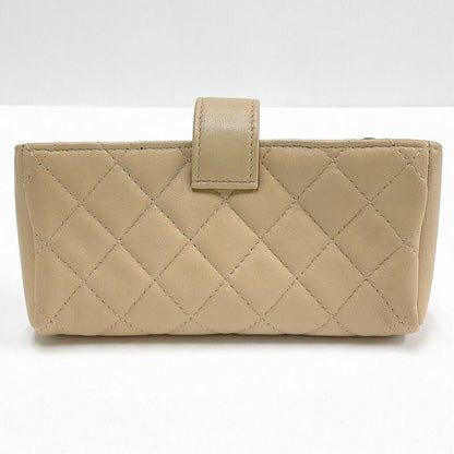 Chanel Quilted Mini Pouch Handbag Lambskin Beige Gold